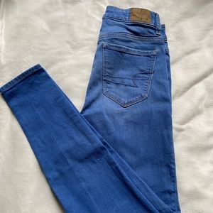 High rise skinny jeans mid wash